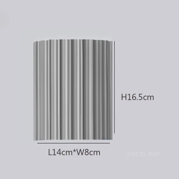 Elegancka okrągła lampa ścienna w delikatnych kolorach